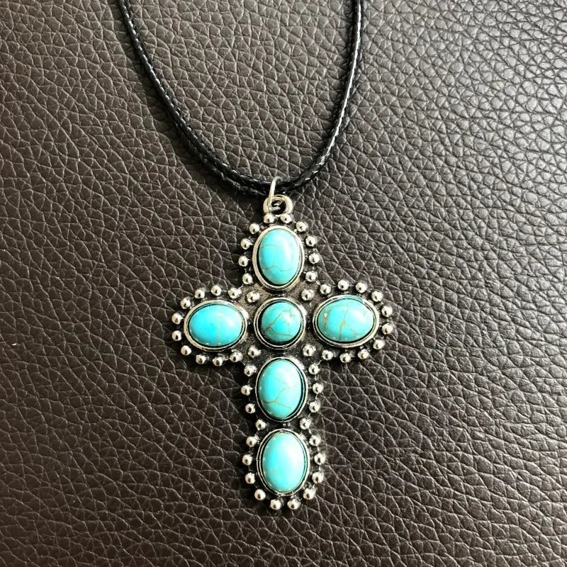 Bohemian zilveren ketting met turquoise kruishanger