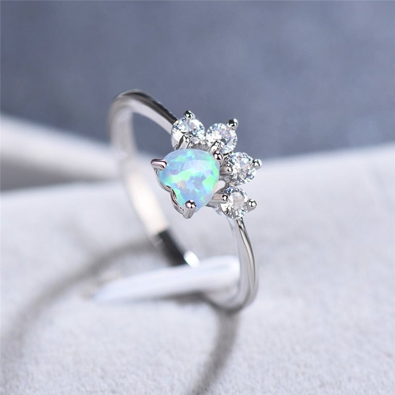 Zilveren ring met blauwe opaal en zirkonia