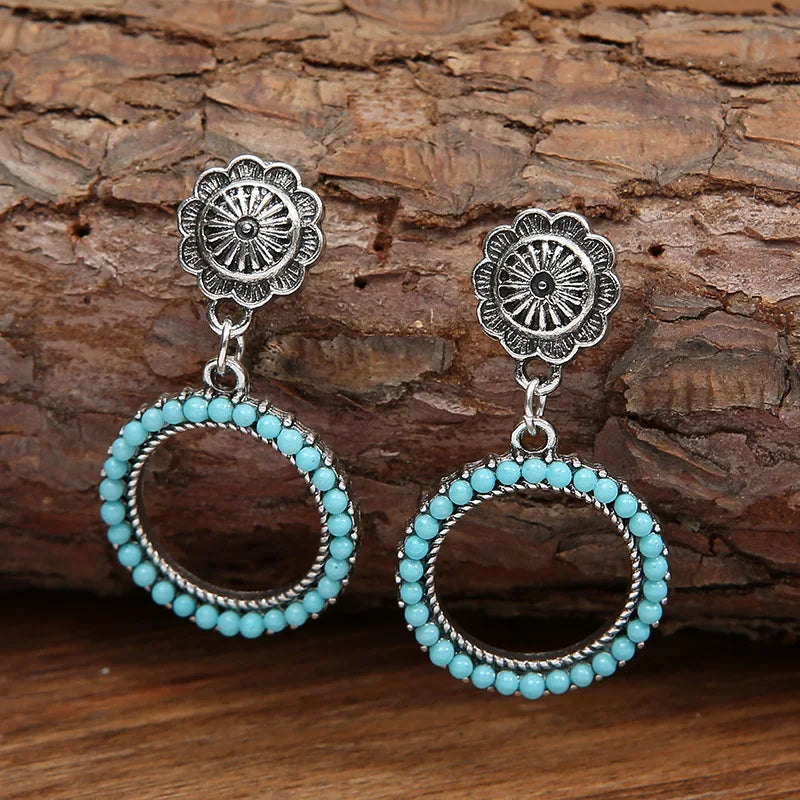 Zilveren vintage oorbellen met turquoise kralenring
