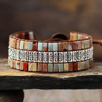 Boho leren armband met turquoise tegels en bloemband