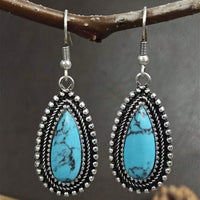 Zilveren bohemian oorbellen met druppel turquoise