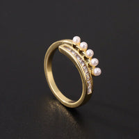 Gouden open ring met zirkonia en parels