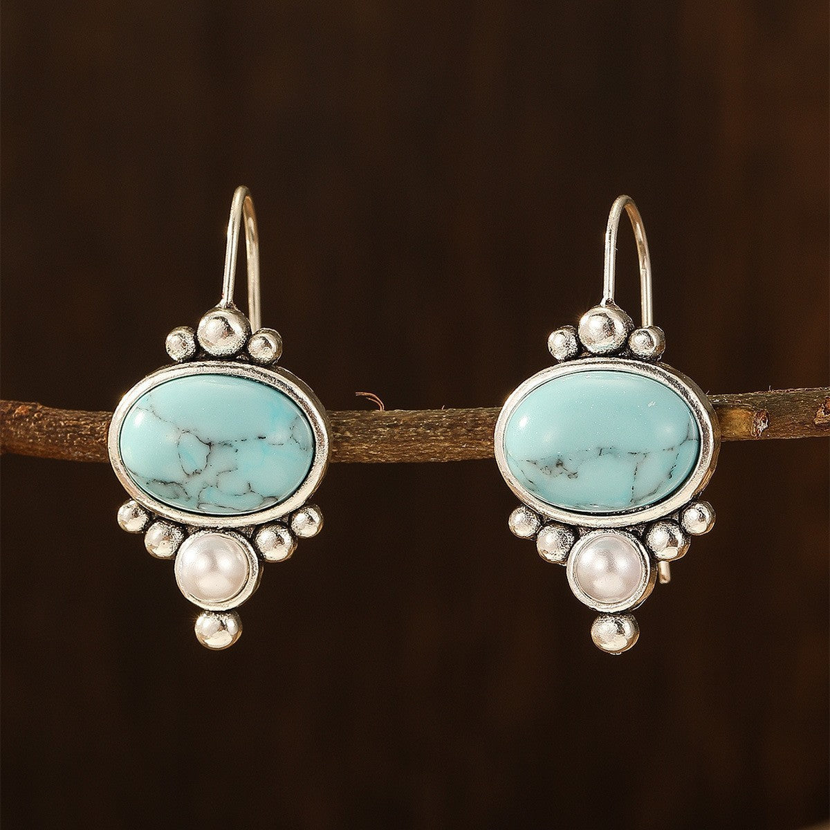Zilveren vintage oorbellen met turquoise en parel