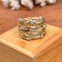 Gouden tak-ring met verspreide zirkonia