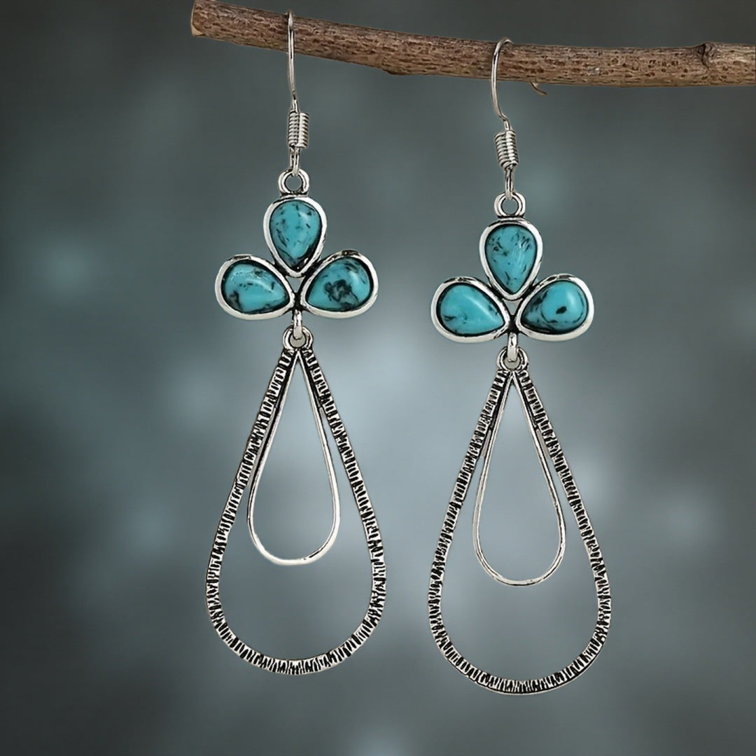 Zilveren bohemian oorbellen met turquoise druppels
