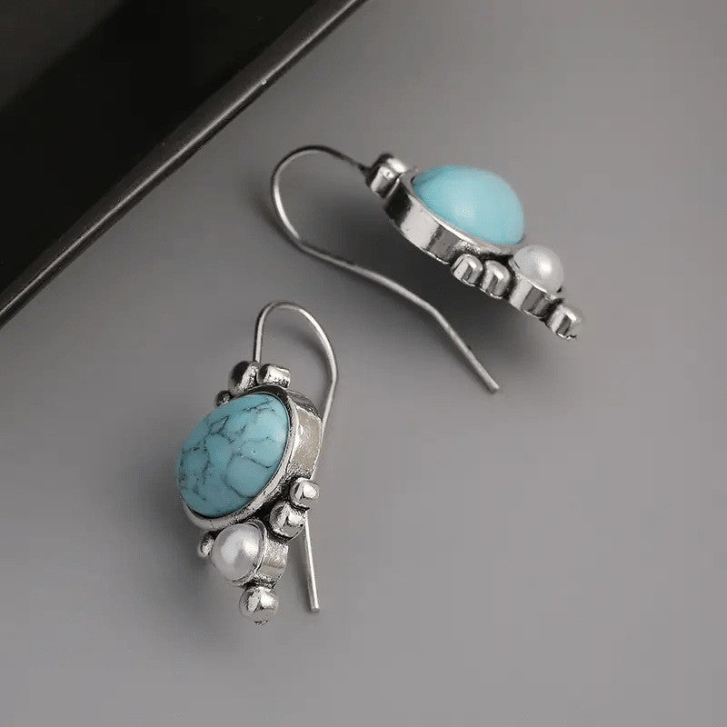 Zilveren vintage oorbellen met turquoise en parel