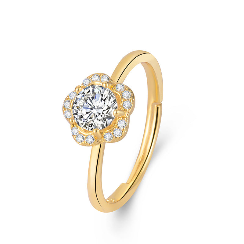 Gouden bloemring met sprankelende zirconia