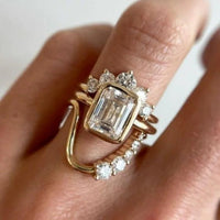 Gouden ringenset met emerald-geslepen zirkonia