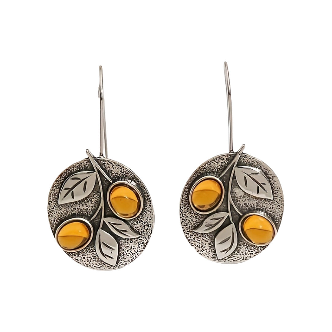 Zilveren vintage oorbellen met amber en blaadjes