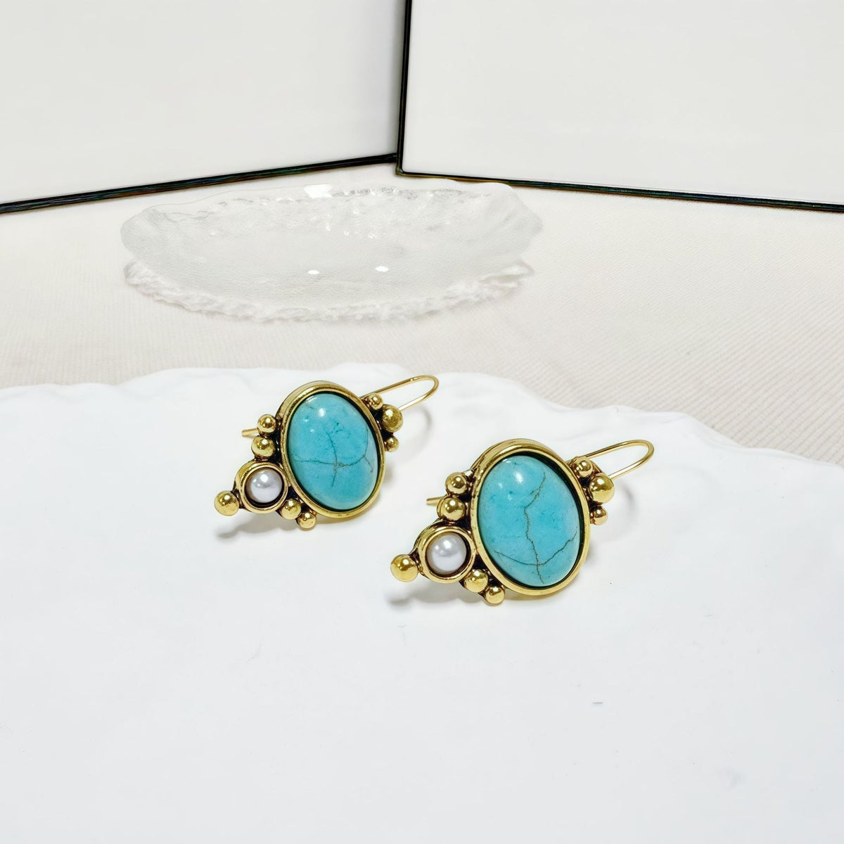 Zilveren vintage oorbellen met turquoise en parel
