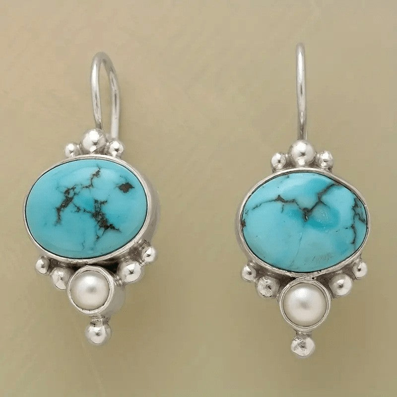 Zilveren vintage oorbellen met turquoise en parel
