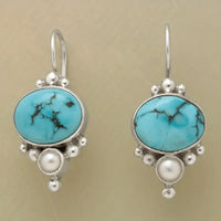 Zilveren vintage oorbellen met turquoise en parel