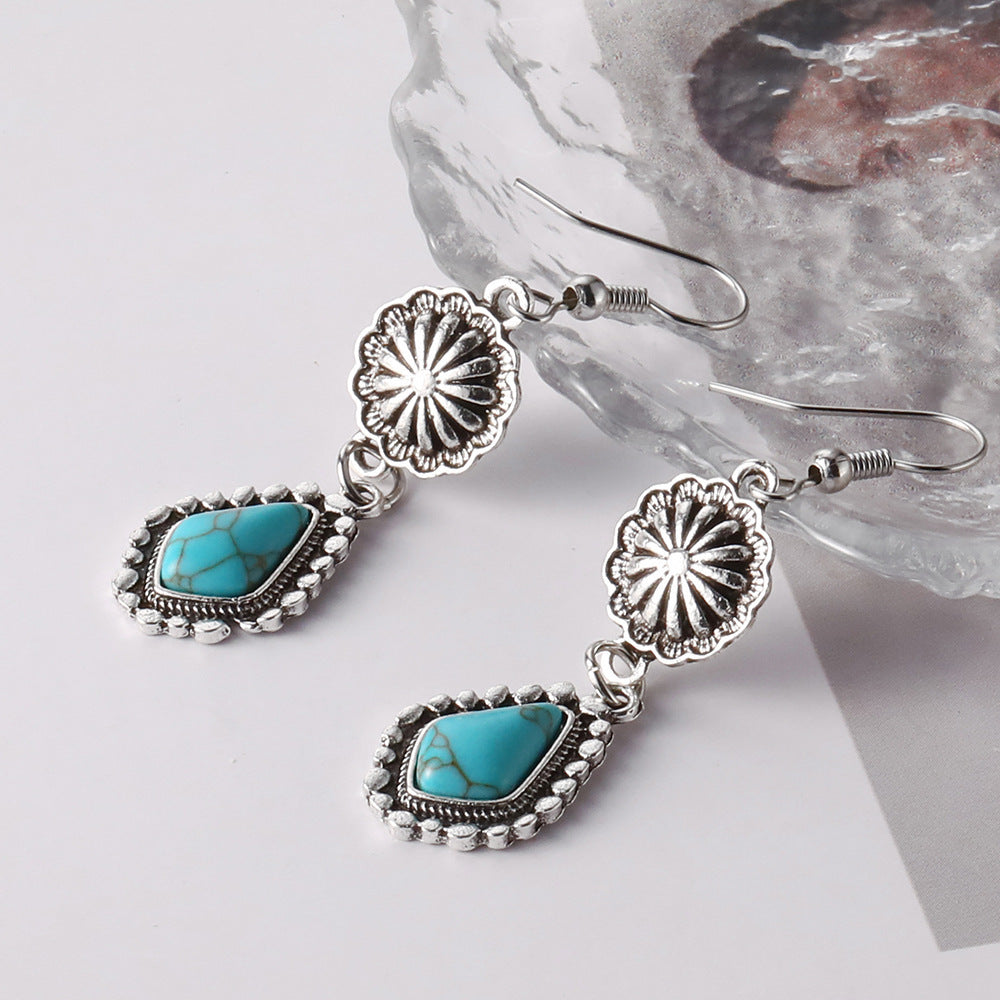 Zilveren ring met turquoise bloemcluster
