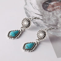 Zilveren ring met turquoise bloemcluster