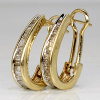 Gouden oorbellen met baguette zirkonia en omega-sluiting
