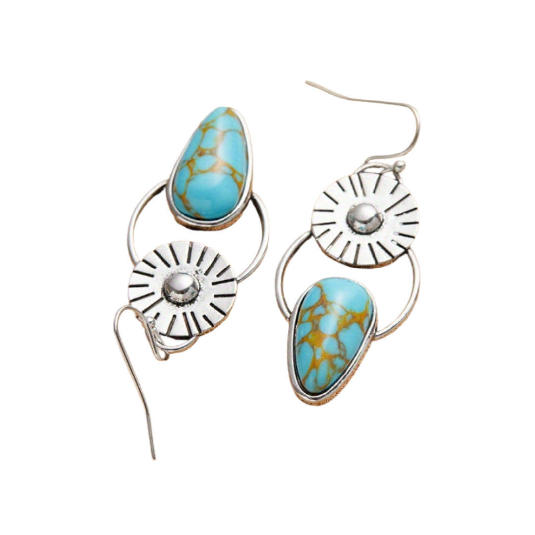Zilveren vintage oorbellen met turquoise en zonnestraal