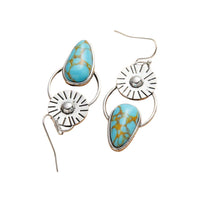 Zilveren vintage oorbellen met turquoise en zonnestraal