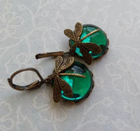Vintage oorbellen met libelle en blauwe steen