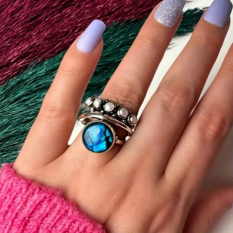 Zilveren ringenset met blauwe steen en parels