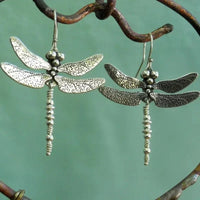 Zilveren bohemian oorbellen met libelle