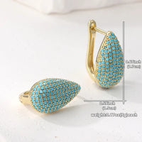 Gouden druppeloorbellen met turquoise pavé