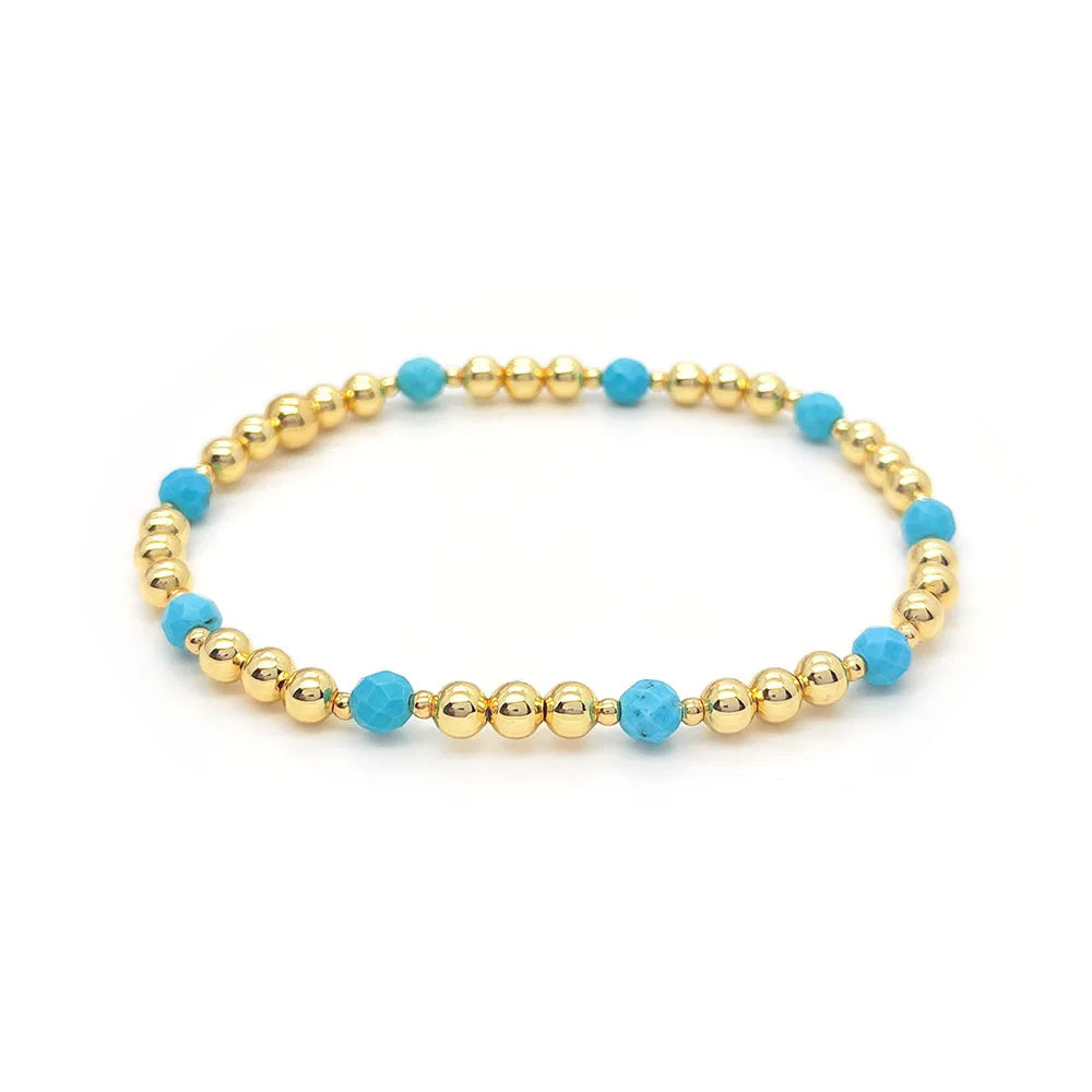Gouden armband met turquoise kralen