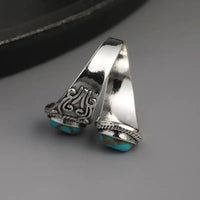 Zilveren vintage wikkelring met turquoise stenen