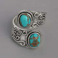 Zilveren vintage wikkelring met turquoise stenen