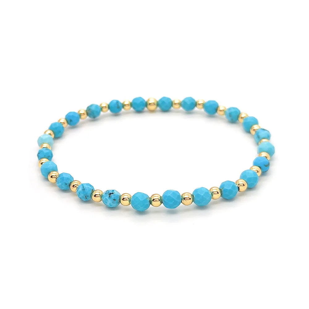 Gouden armband met turquoise kralen