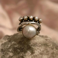 Zilveren ring met parels en gouden accenten