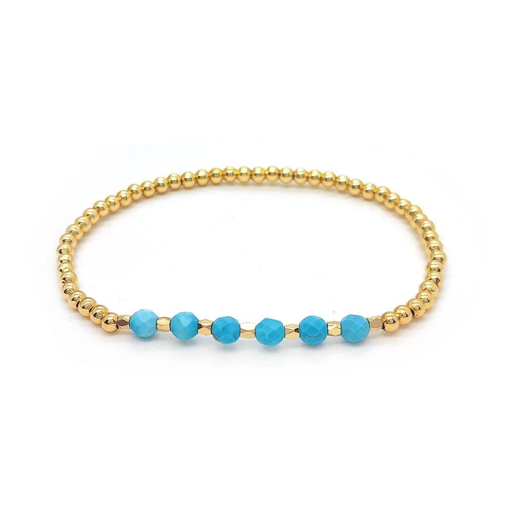 Gouden armband met turquoise kralen