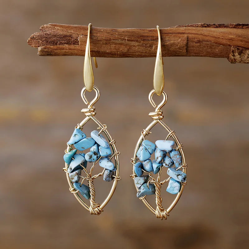 Zilveren vintage filigrein oorbellen met blauwe en gele edelsteen