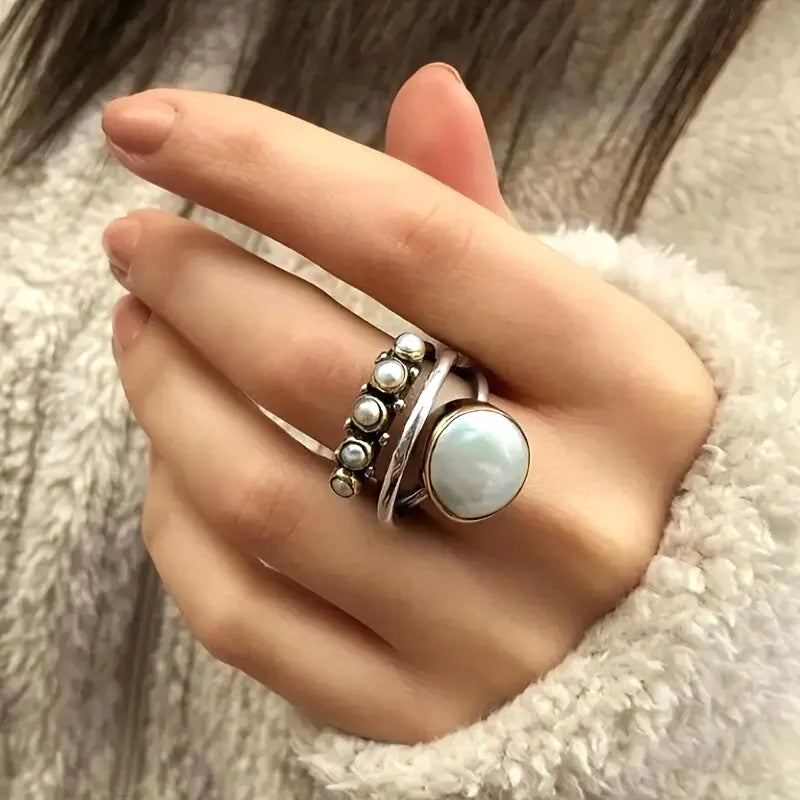 Zilveren ring met parels en gouden accenten
