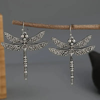 Zilveren bohemian oorbellen met libelle