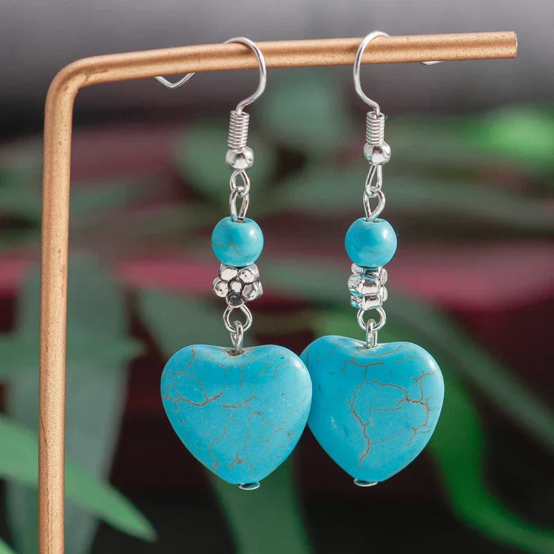 Zilveren oorbellen met turquoise hart
