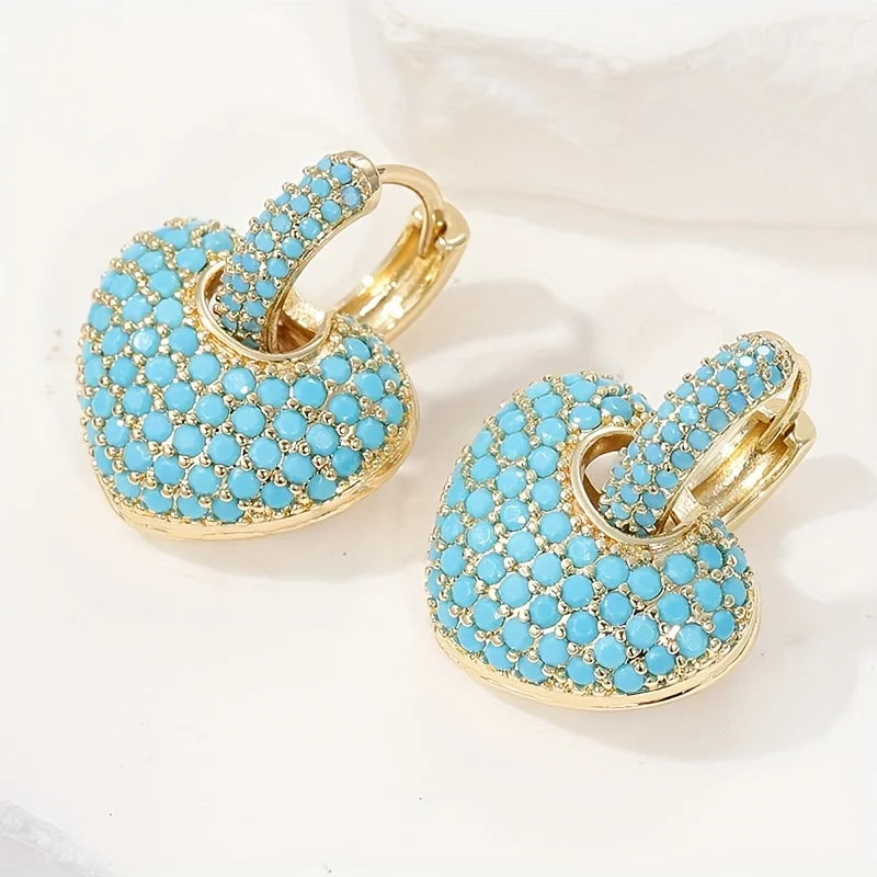 Gouden hart-oorbellen met turquoise pavé