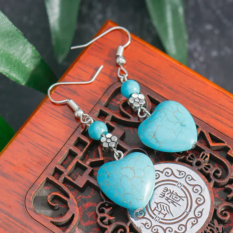 Zilveren oorbellen met turquoise hart