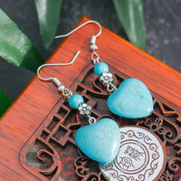 Zilveren oorbellen met turquoise hart