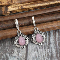 Zilveren vintage oorbellen met roze druppelstenen