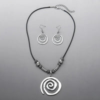 Zilveren bohemian spiraal set met ketting en oorbellen