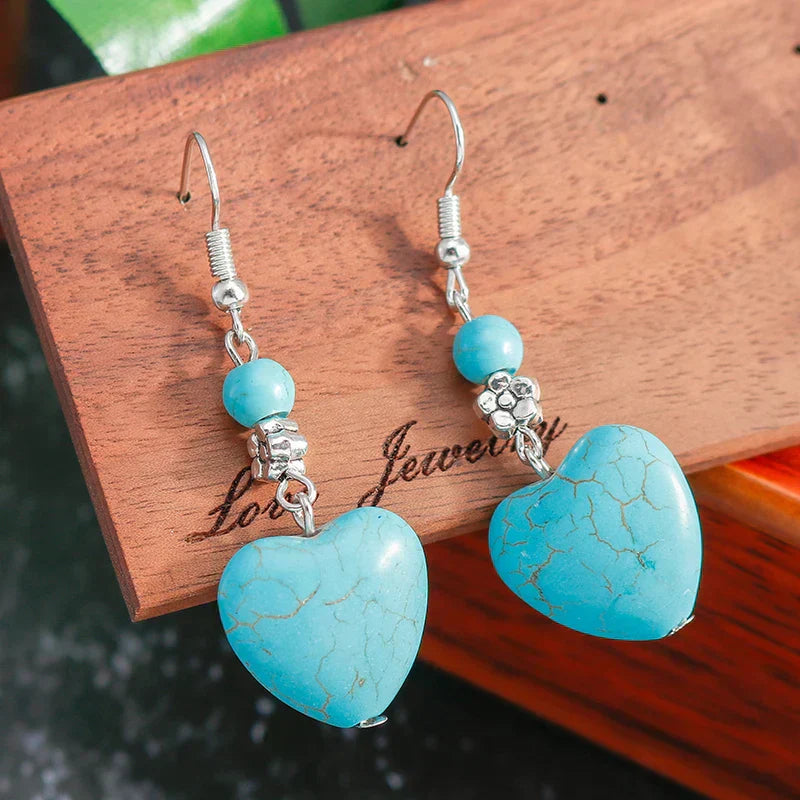 Zilveren oorbellen met turquoise hart