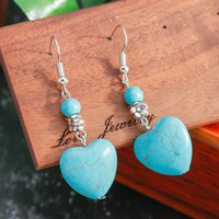 Zilveren oorbellen met turquoise hart