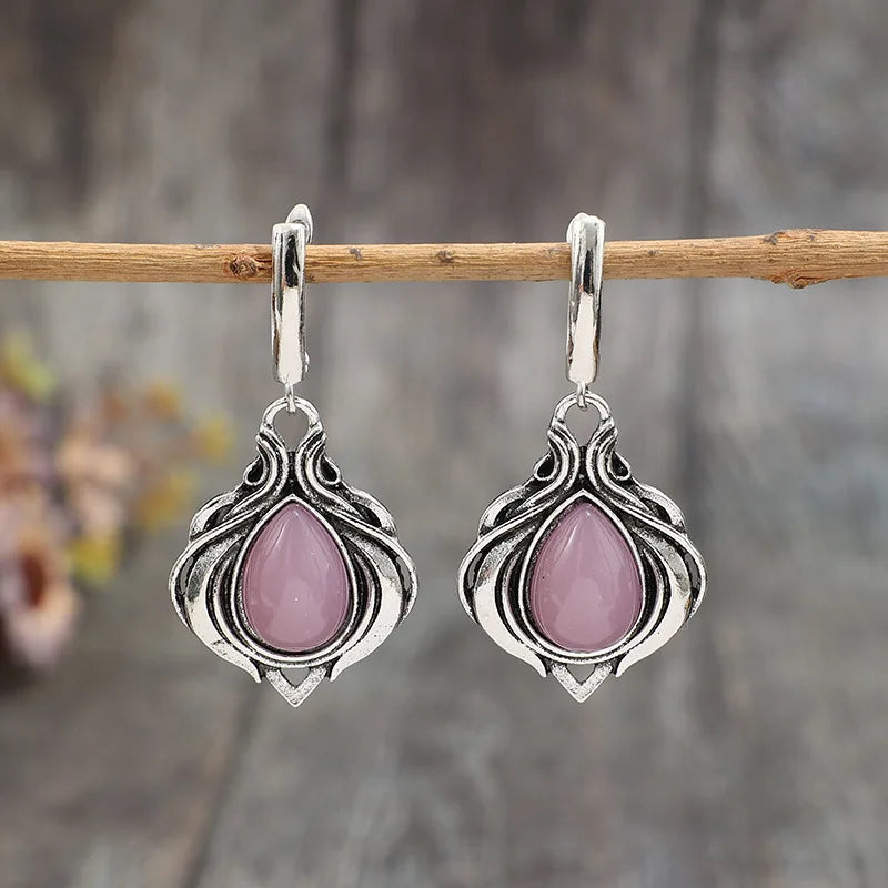 Zilveren vintage oorbellen met roze druppelstenen