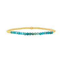 Set van turquoise en gouden kralenarmbanden