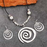 Zilveren bohemian spiraal set met ketting en oorbellen
