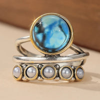 Zilveren ringenset met blauwe steen en parels