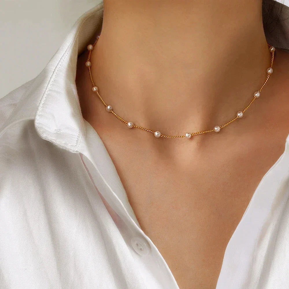 Fijne gouden ketting met mini-parels