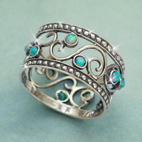 Zilveren bohemian ring met turquoise opaal