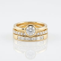Gouden ringenset met solitair en baguette zirkonia