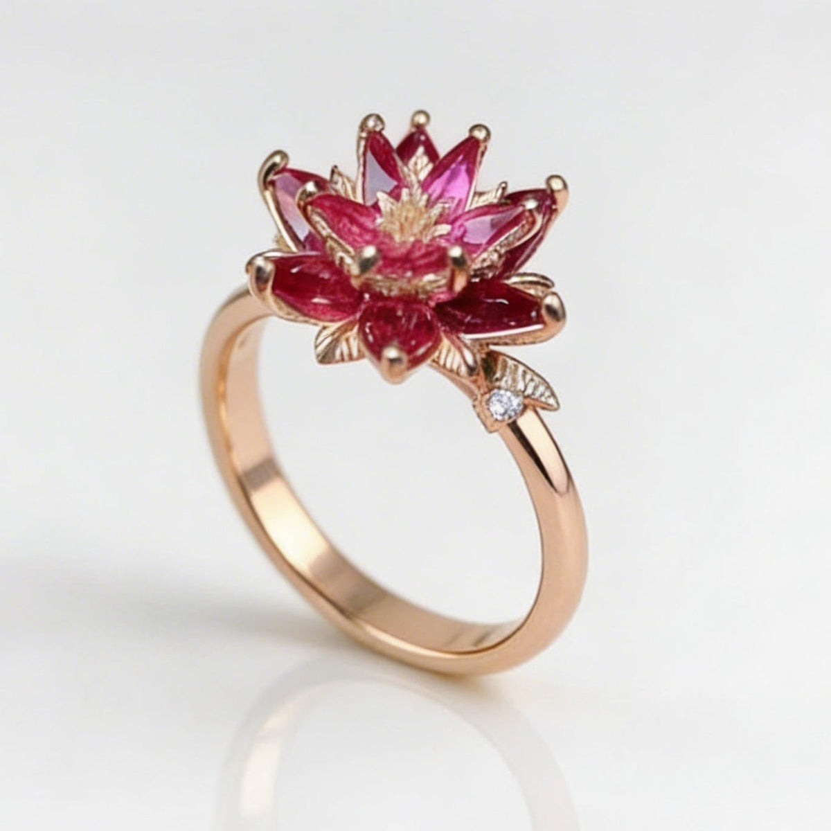 Roségouden lotusring met robijnrode zirkonia